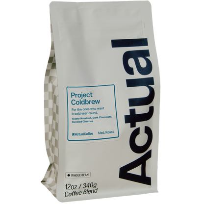 A 12oz bag of Actual Coffee's Project Coldbrew Whole Bean coffee blend, shown on a clean white background.